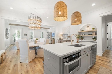 Welcome to 133 E Firethorn Circle, a coastal retreat nestled on on Origins Golf Club in Florida - for sale on GolfHomes.com, golf home, golf lot