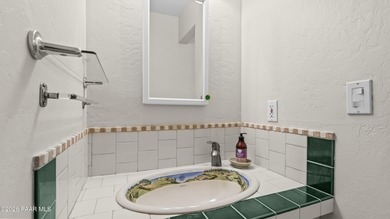 Perched directly on the fairway in Prescott Country Club, this on Prescott Golf and Country Club in Arizona - for sale on GolfHomes.com, golf home, golf lot