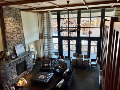 The Penthouses at the Lodge at Spruce Peak provides a mountain on Stowe Mountain Club in Vermont - for sale on GolfHomes.com, golf home, golf lot