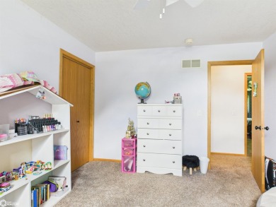 Charming walk-out ranch nestled in a family-friendly on Edmundson Golf Course in Iowa - for sale on GolfHomes.com, golf home, golf lot