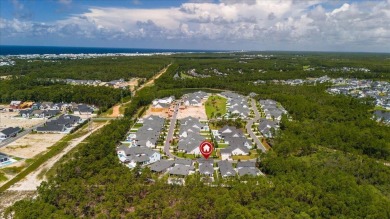 Welcome to 133 E Firethorn Circle, a coastal retreat nestled on on Origins Golf Club in Florida - for sale on GolfHomes.com, golf home, golf lot
