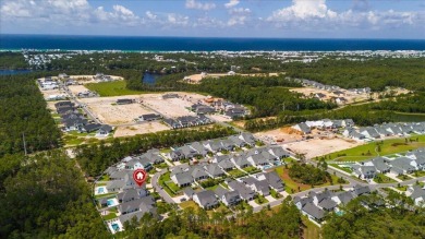 Welcome to 133 E Firethorn Circle, a coastal retreat nestled on on Origins Golf Club in Florida - for sale on GolfHomes.com, golf home, golf lot