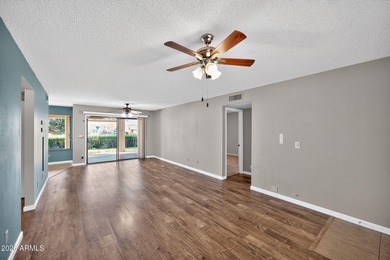 Welcome to easy living in this charming 2 bed, 2 bath home on Fountain of the Sun Country Club in Arizona - for sale on GolfHomes.com, golf home, golf lot