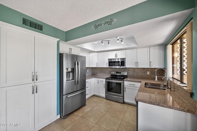 Welcome to easy living in this charming 2 bed, 2 bath home on Fountain of the Sun Country Club in Arizona - for sale on GolfHomes.com, golf home, golf lot