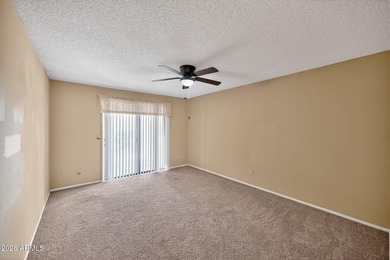 Welcome to easy living in this charming 2 bed, 2 bath home on Fountain of the Sun Country Club in Arizona - for sale on GolfHomes.com, golf home, golf lot