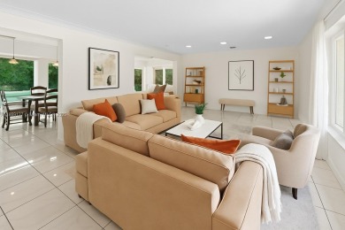 Beautiful light and bright pool home in a gated residential golf on Normandy Shores Golf Course in Florida - for sale on GolfHomes.com, golf home, golf lot