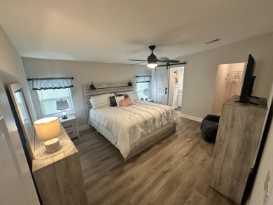 This beautifully remodeled Palm Harbor stucco home is a on Del Tura Golf and Country Club in Florida - for sale on GolfHomes.com, golf home, golf lot