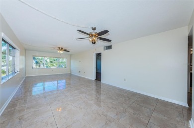 Just minutes from the soft sands of Madeira Beach, this on Seminole Lake Country Club in Florida - for sale on GolfHomes.com, golf home, golf lot