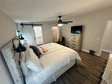 This beautifully remodeled Palm Harbor stucco home is a on Del Tura Golf and Country Club in Florida - for sale on GolfHomes.com, golf home, golf lot
