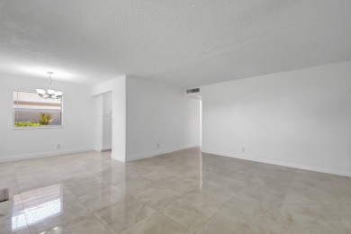 Beautifully updated first-floor unit in the sought-after Kings on Kings Point Golf - Executive in Florida - for sale on GolfHomes.com, golf home, golf lot