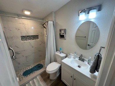 This beautifully remodeled Palm Harbor stucco home is a on Del Tura Golf and Country Club in Florida - for sale on GolfHomes.com, golf home, golf lot