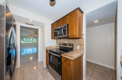 Just minutes from the soft sands of Madeira Beach, this on Seminole Lake Country Club in Florida - for sale on GolfHomes.com, golf home, golf lot