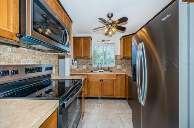 Just minutes from the soft sands of Madeira Beach, this on Seminole Lake Country Club in Florida - for sale on GolfHomes.com, golf home, golf lot