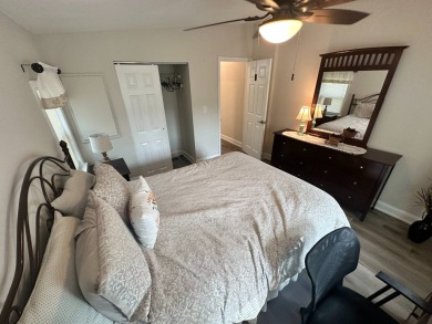 This beautifully remodeled Palm Harbor stucco home is a on Del Tura Golf and Country Club in Florida - for sale on GolfHomes.com, golf home, golf lot