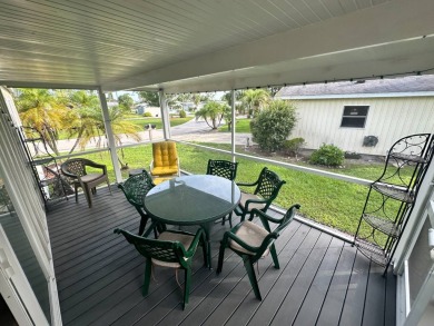 This beautifully remodeled Palm Harbor stucco home is a on Del Tura Golf and Country Club in Florida - for sale on GolfHomes.com, golf home, golf lot