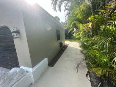 This beautifully remodeled Palm Harbor stucco home is a on Del Tura Golf and Country Club in Florida - for sale on GolfHomes.com, golf home, golf lot