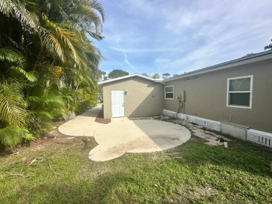 This beautifully remodeled Palm Harbor stucco home is a on Del Tura Golf and Country Club in Florida - for sale on GolfHomes.com, golf home, golf lot