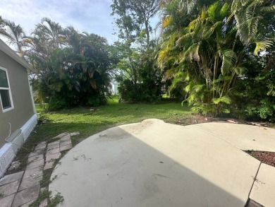 This beautifully remodeled Palm Harbor stucco home is a on Del Tura Golf and Country Club in Florida - for sale on GolfHomes.com, golf home, golf lot