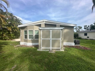 This beautifully remodeled Palm Harbor stucco home is a on Del Tura Golf and Country Club in Florida - for sale on GolfHomes.com, golf home, golf lot