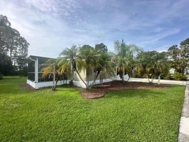 This beautifully remodeled Palm Harbor stucco home is a on Del Tura Golf and Country Club in Florida - for sale on GolfHomes.com, golf home, golf lot