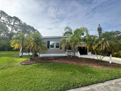 This beautifully remodeled Palm Harbor stucco home is a on Del Tura Golf and Country Club in Florida - for sale on GolfHomes.com, golf home, golf lot