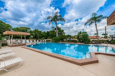 Just minutes from the soft sands of Madeira Beach, this on Seminole Lake Country Club in Florida - for sale on GolfHomes.com, golf home, golf lot