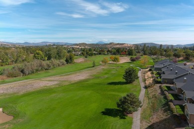 This stunning home in a gated community offers beautiful views on Eagle Point Golf Course in Oregon - for sale on GolfHomes.com, golf home, golf lot