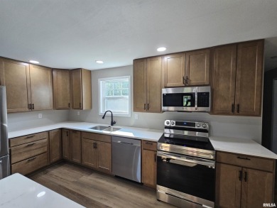 This stunning ranch-style home has been completely remodeled and on Green Hills Golf Club in Illinois - for sale on GolfHomes.com, golf home, golf lot
