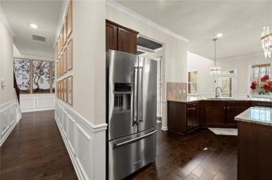 Welcome to 404 Prague Way, an exquisite residence nestled in the on Crystal Lake Golf and Country Club in Georgia - for sale on GolfHomes.com, golf home, golf lot