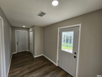 This stunning ranch-style home has been completely remodeled and on Green Hills Golf Club in Illinois - for sale on GolfHomes.com, golf home, golf lot
