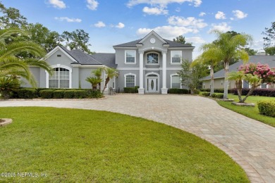 Welcome to this beautiful home located in the prestigious, gated on Country Club of Orange Park in Florida - for sale on GolfHomes.com, golf home, golf lot