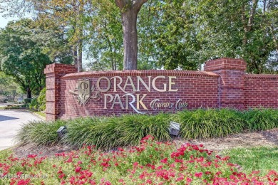 Welcome to this beautiful home located in the prestigious, gated on Country Club of Orange Park in Florida - for sale on GolfHomes.com, golf home, golf lot