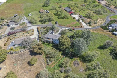 Charming 3-Bed, 2-Bath Home with Stunning Views  Lake Tulloch on The Club at Copper Valley Golf Course in California - for sale on GolfHomes.com, golf home, golf lot