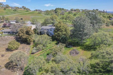 Charming 3-Bed, 2-Bath Home with Stunning Views  Lake Tulloch on The Club at Copper Valley Golf Course in California - for sale on GolfHomes.com, golf home, golf lot