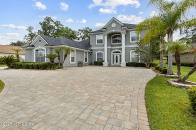 Welcome to this beautiful home located in the prestigious, gated on Country Club of Orange Park in Florida - for sale on GolfHomes.com, golf home, golf lot