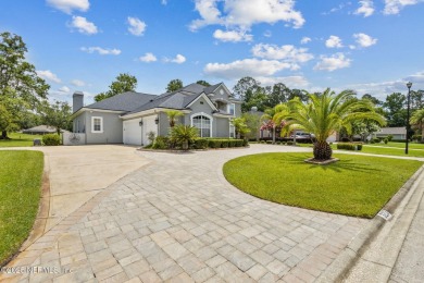 Welcome to this beautiful home located in the prestigious, gated on Country Club of Orange Park in Florida - for sale on GolfHomes.com, golf home, golf lot
