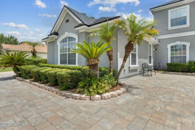 Welcome to this beautiful home located in the prestigious, gated on Country Club of Orange Park in Florida - for sale on GolfHomes.com, golf home, golf lot