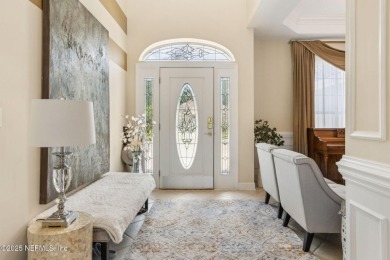 Welcome to this beautiful home located in the prestigious, gated on Country Club of Orange Park in Florida - for sale on GolfHomes.com, golf home, golf lot