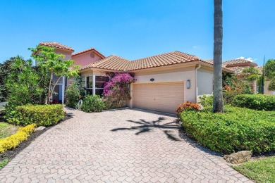From the moment you walk in, you're greeted with volume ceilings on Indian Spring Golf and Country Club in Florida - for sale on GolfHomes.com, golf home, golf lot