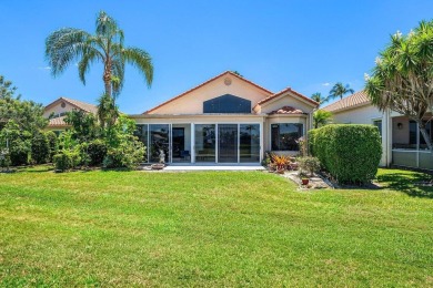 From the moment you walk in, you're greeted with volume ceilings on Indian Spring Golf and Country Club in Florida - for sale on GolfHomes.com, golf home, golf lot