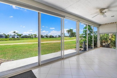 From the moment you walk in, you're greeted with volume ceilings on Indian Spring Golf and Country Club in Florida - for sale on GolfHomes.com, golf home, golf lot