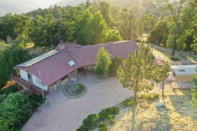 Find serenity in this first time on the market rustic ranch on Oak Tree Country Club in California - for sale on GolfHomes.com, golf home, golf lot