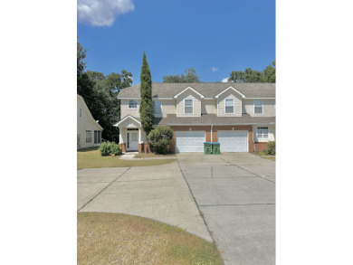 This well-maintained end-unit townhome features an open floor on  in Florida - for sale on GolfHomes.com, golf home, golf lot