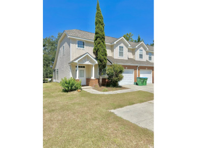 This well-maintained end-unit townhome features an open floor on  in Florida - for sale on GolfHomes.com, golf home, golf lot