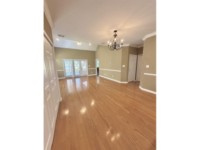 This well-maintained end-unit townhome features an open floor on  in Florida - for sale on GolfHomes.com, golf home, golf lot