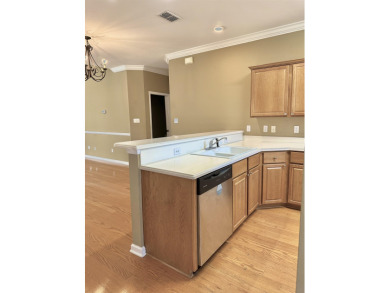 This well-maintained end-unit townhome features an open floor on  in Florida - for sale on GolfHomes.com, golf home, golf lot