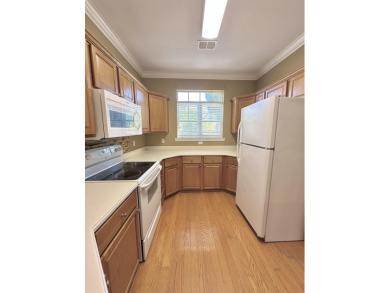 This well-maintained end-unit townhome features an open floor on  in Florida - for sale on GolfHomes.com, golf home, golf lot