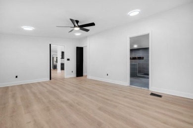 Step inside this beautifully reimagined manufactured home on Jake Gaither Golf Course in Florida - for sale on GolfHomes.com, golf home, golf lot