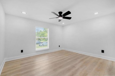 Step inside this beautifully reimagined manufactured home on Jake Gaither Golf Course in Florida - for sale on GolfHomes.com, golf home, golf lot
