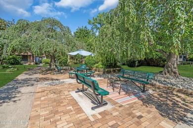 Move in ready 2 bedroom 2 bath upper level unit with views of on Shadow Lake Village in New Jersey - for sale on GolfHomes.com, golf home, golf lot